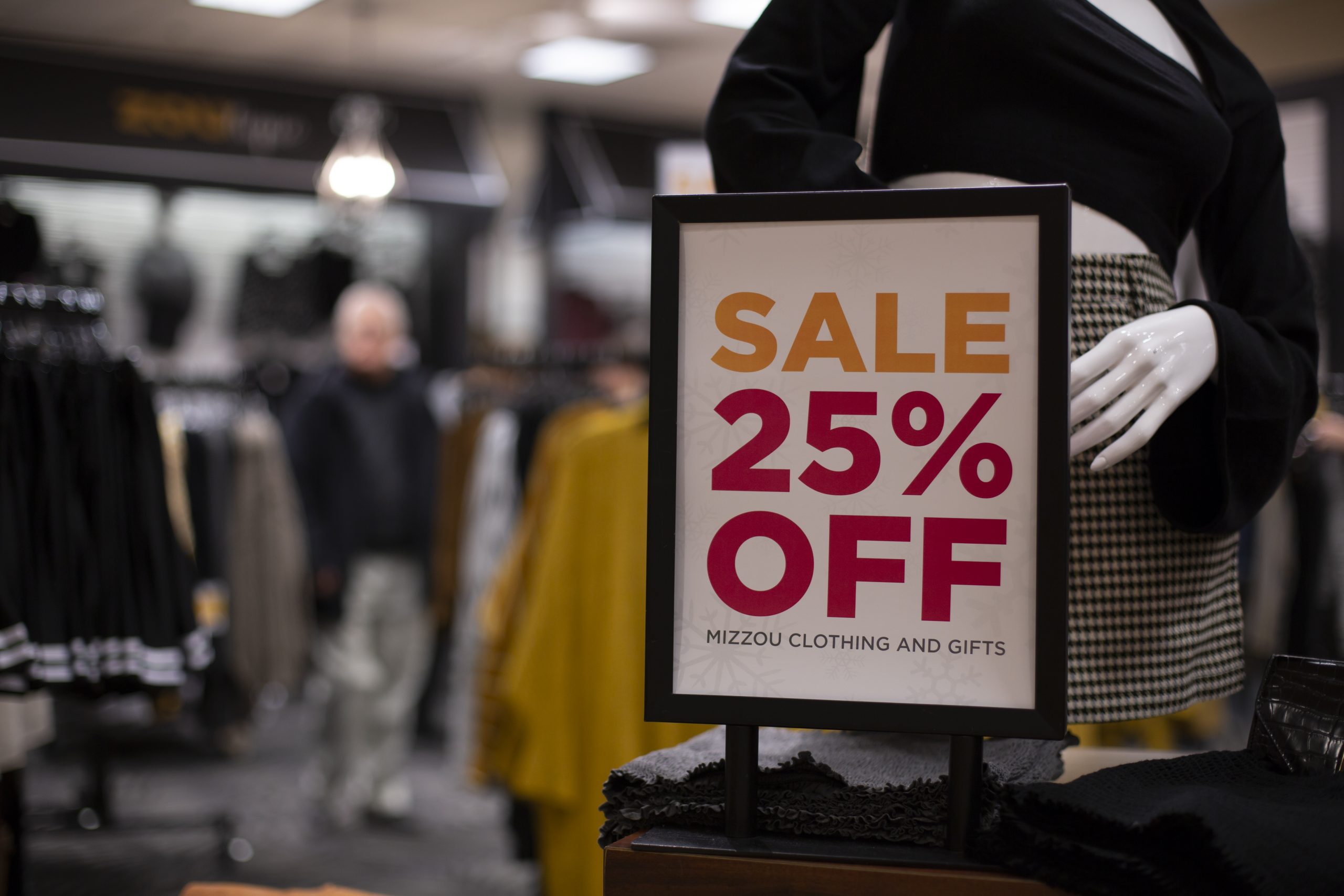 A 25% off sale sign inside The Mizzou Store