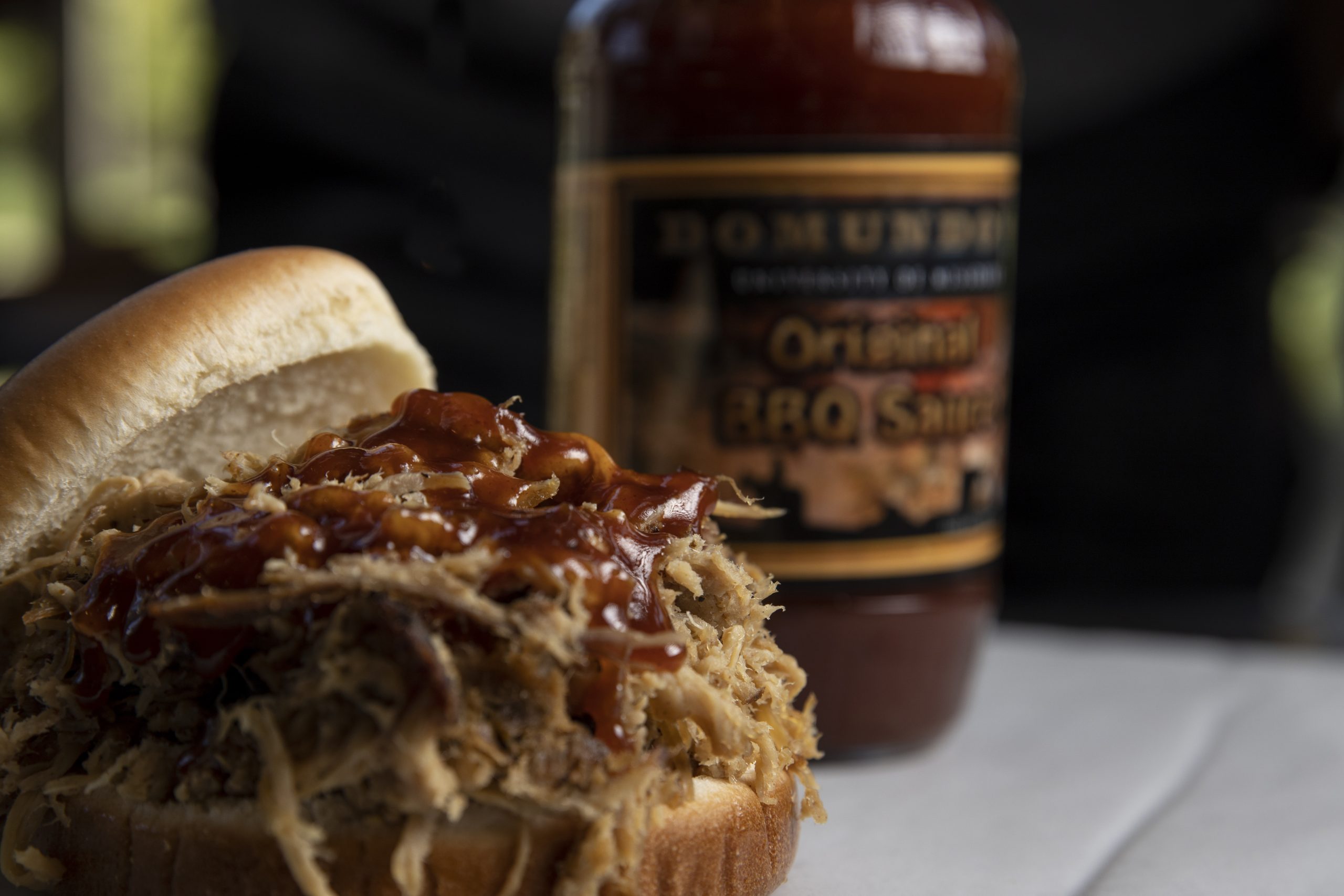 DoMundo’s barbecue sauce and dry rub and pulled pork sandwich in the MU Student Center