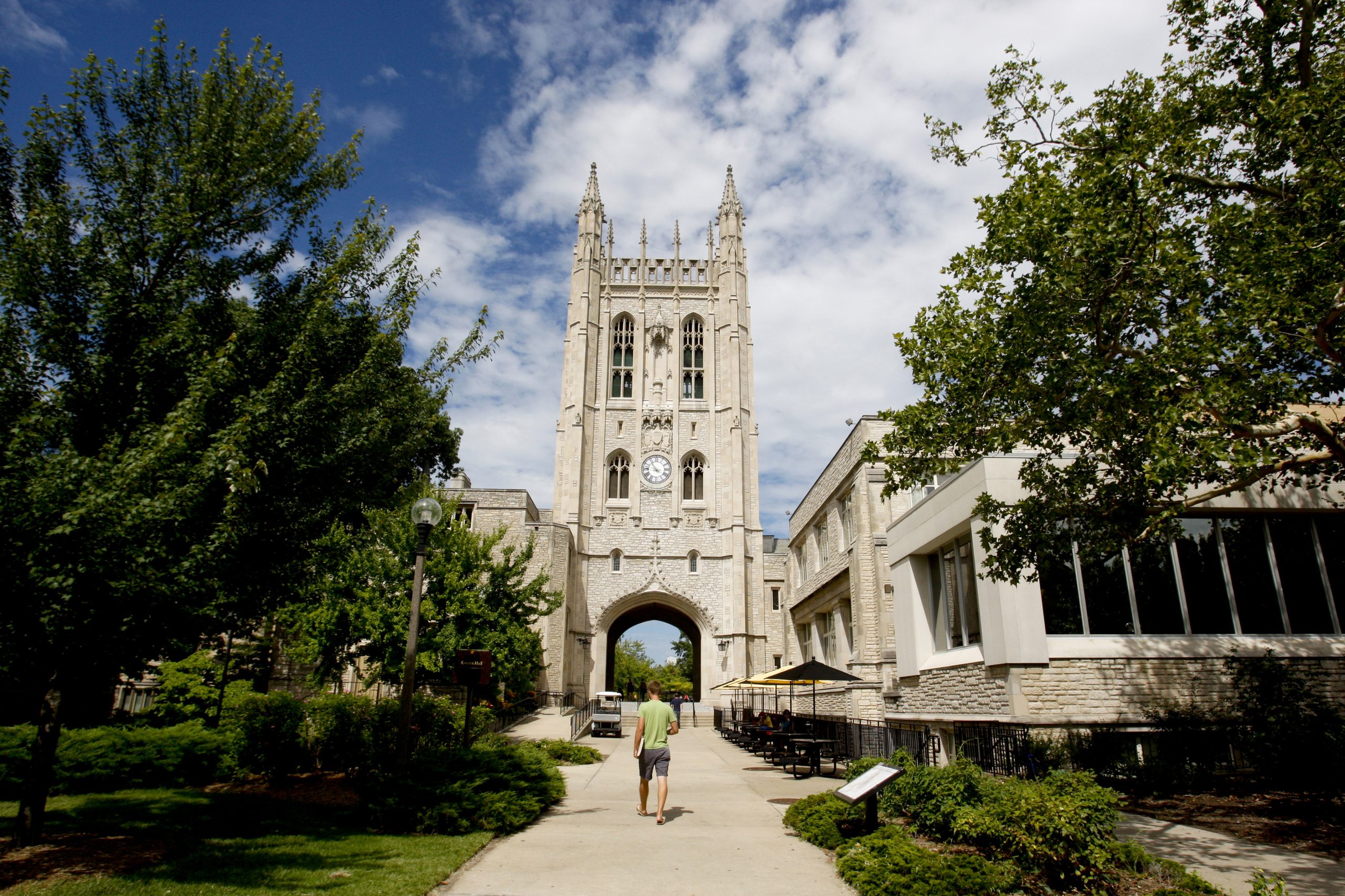 A student walks outside the Memorial Student Union