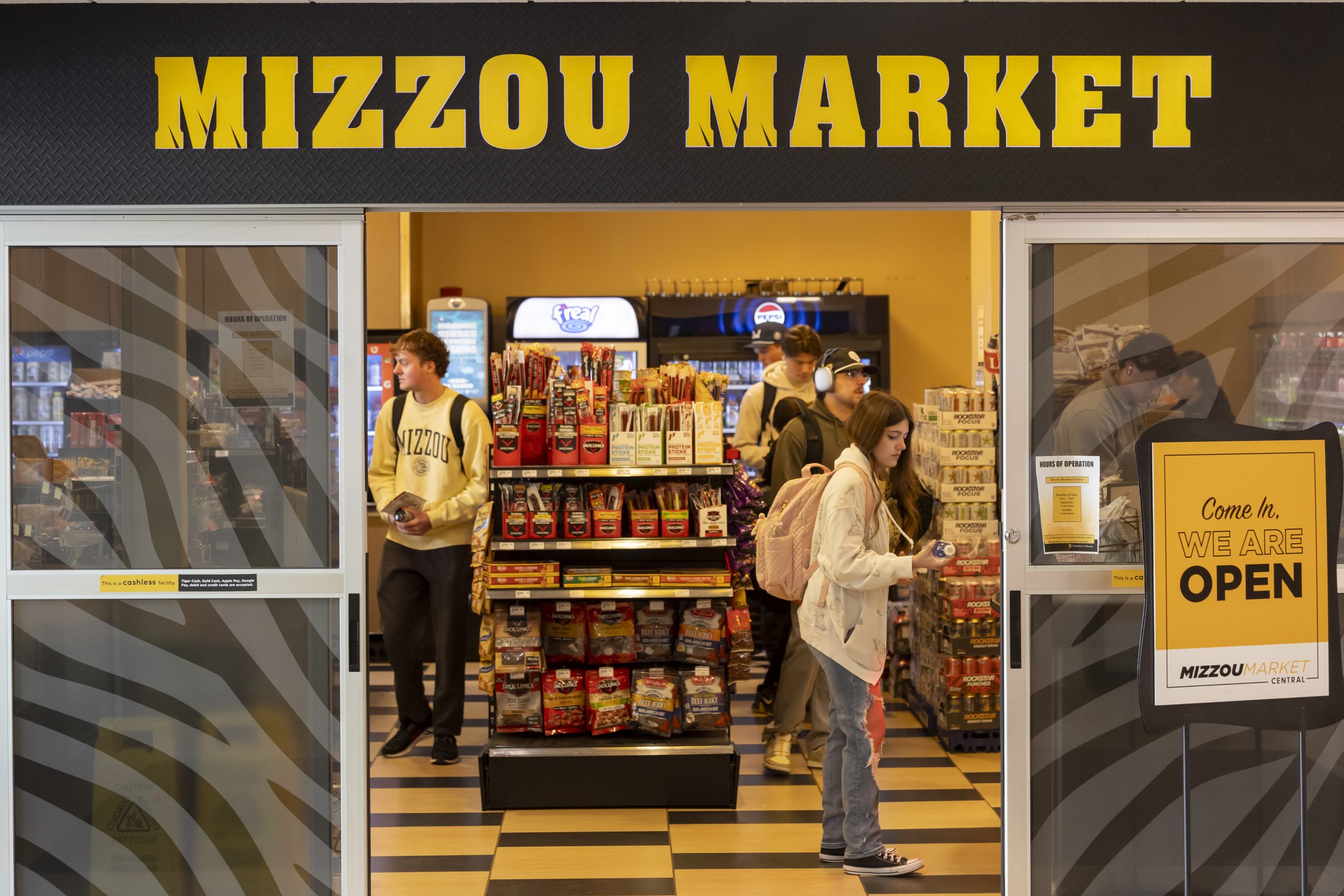 Students buy items at the Mizzou Market-Central convenience store in the MU Student Center