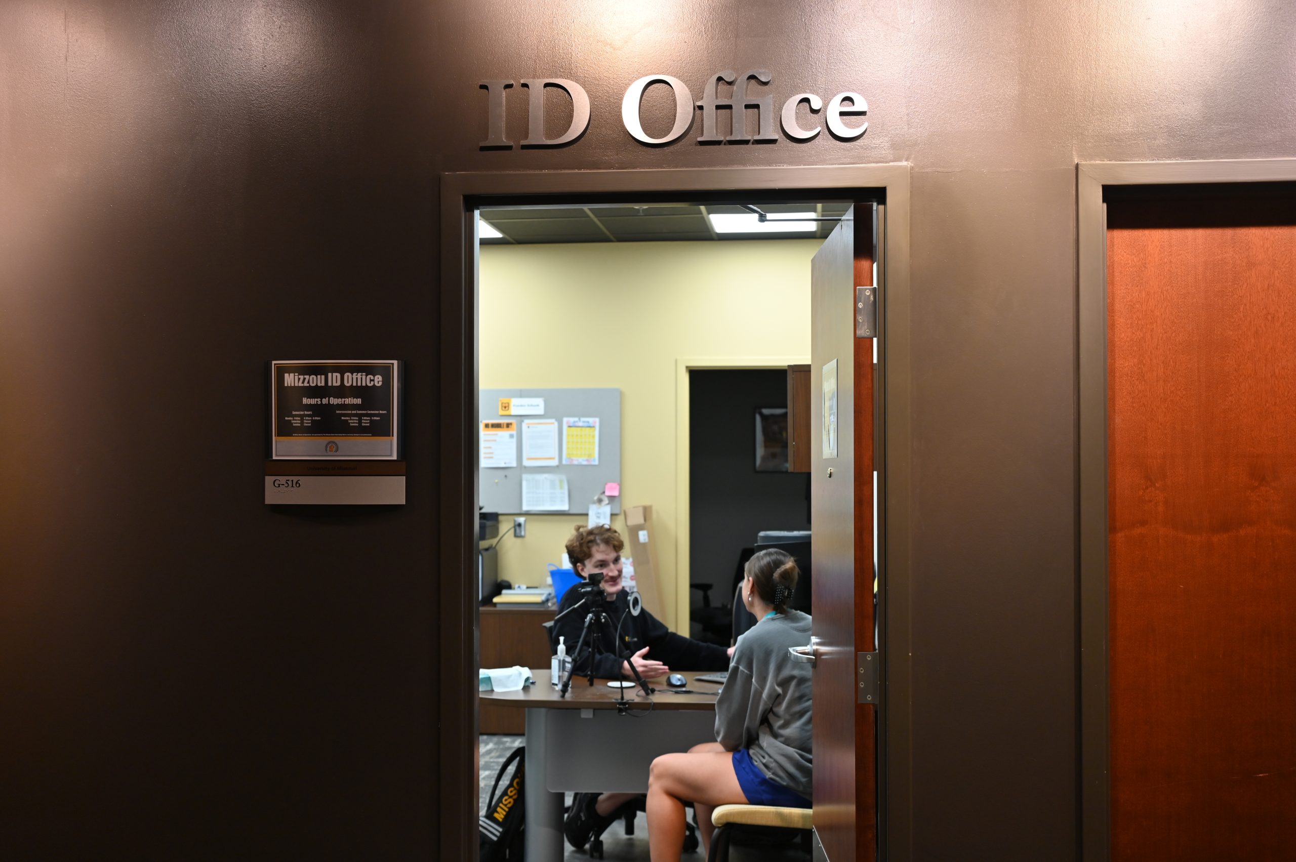 A student gets help inside the ID Office in the MU Student Center